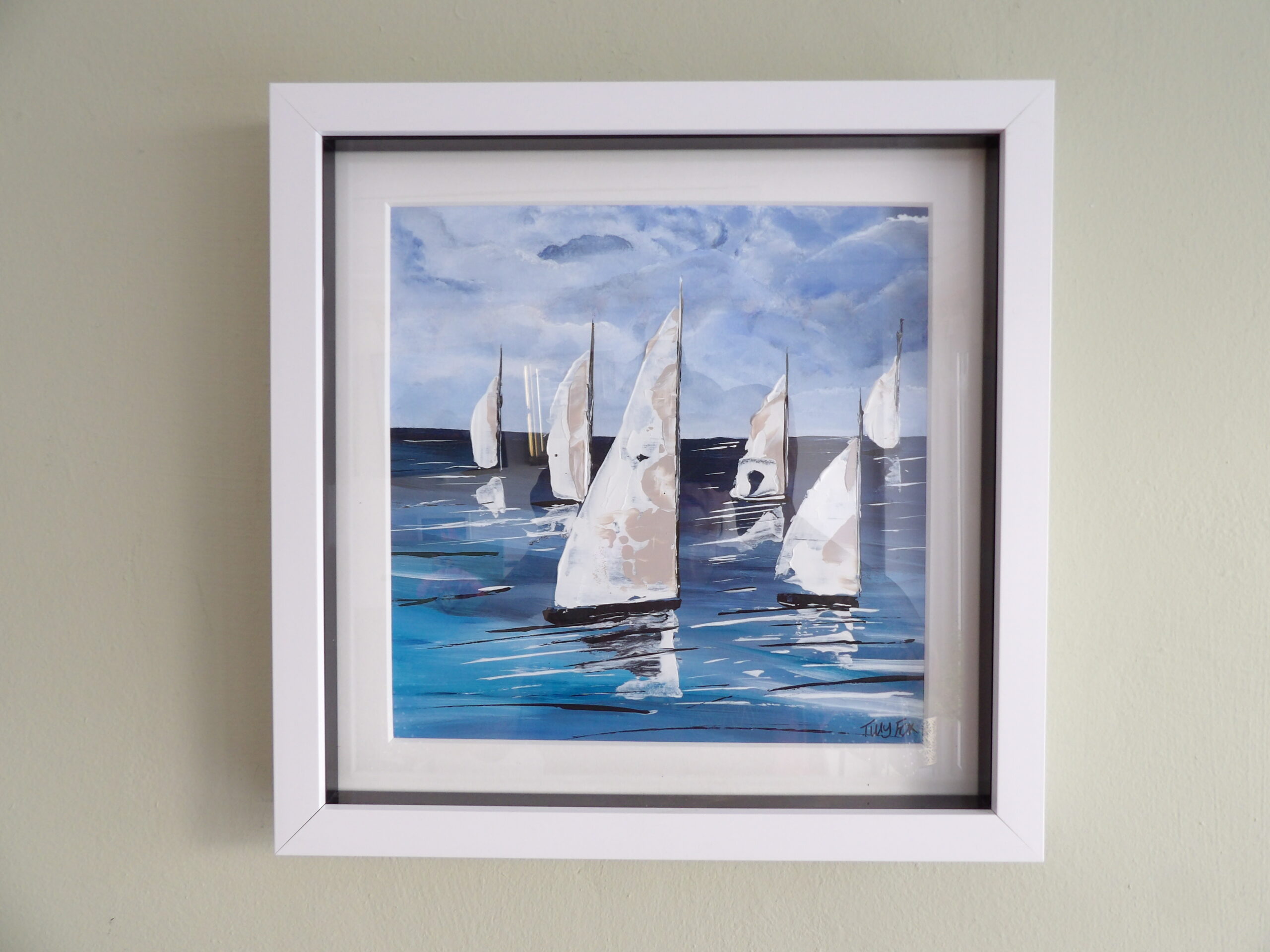 White boats in a 28 x 28cm white frame